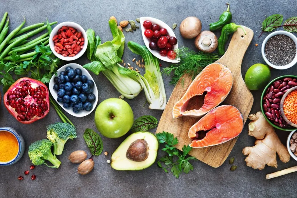 A vibrant display of healthy foods including fruits, vegetables, whole grains, and lean proteins, showcasing the essence of a balanced diet and a healthier lifestyle.